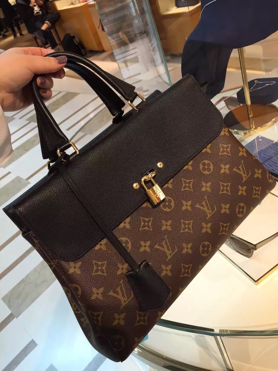 Authentic Louis Vuitton Monogram Coated Canvas Venus Bag M41737